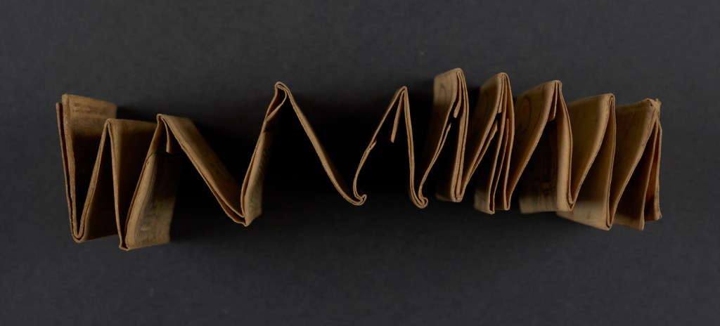 Overhead view of a concertina folding calendar