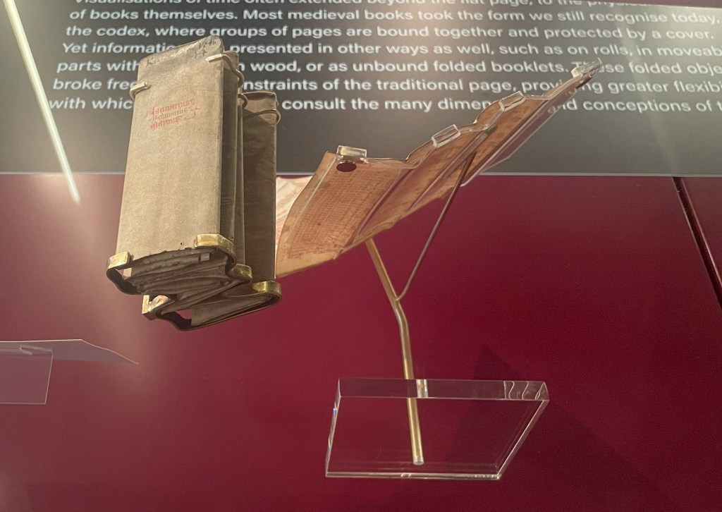 Folded and unfolded bat book showing brass and perspex mounts