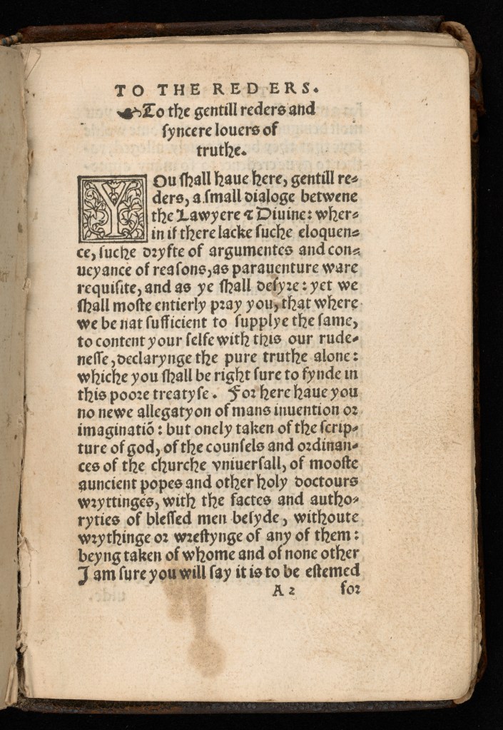 Page of a 16th Century book with woodcut initial.